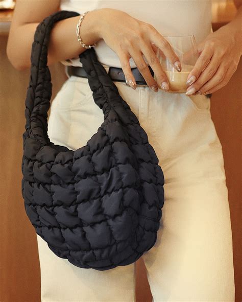 oversized quilted shoulder bag.